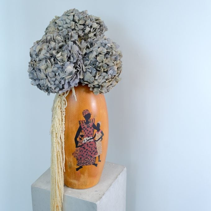 Beautiful dried hydrangea flowers in a decorative vase, perfect for wholesale floral decor.